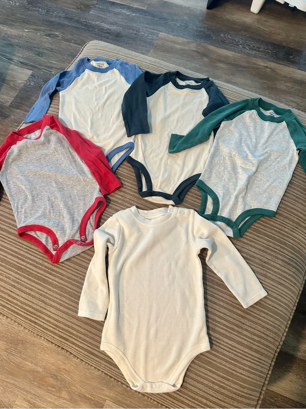 Size 18 month long-sleeve onesies. Never worn, NWOT.